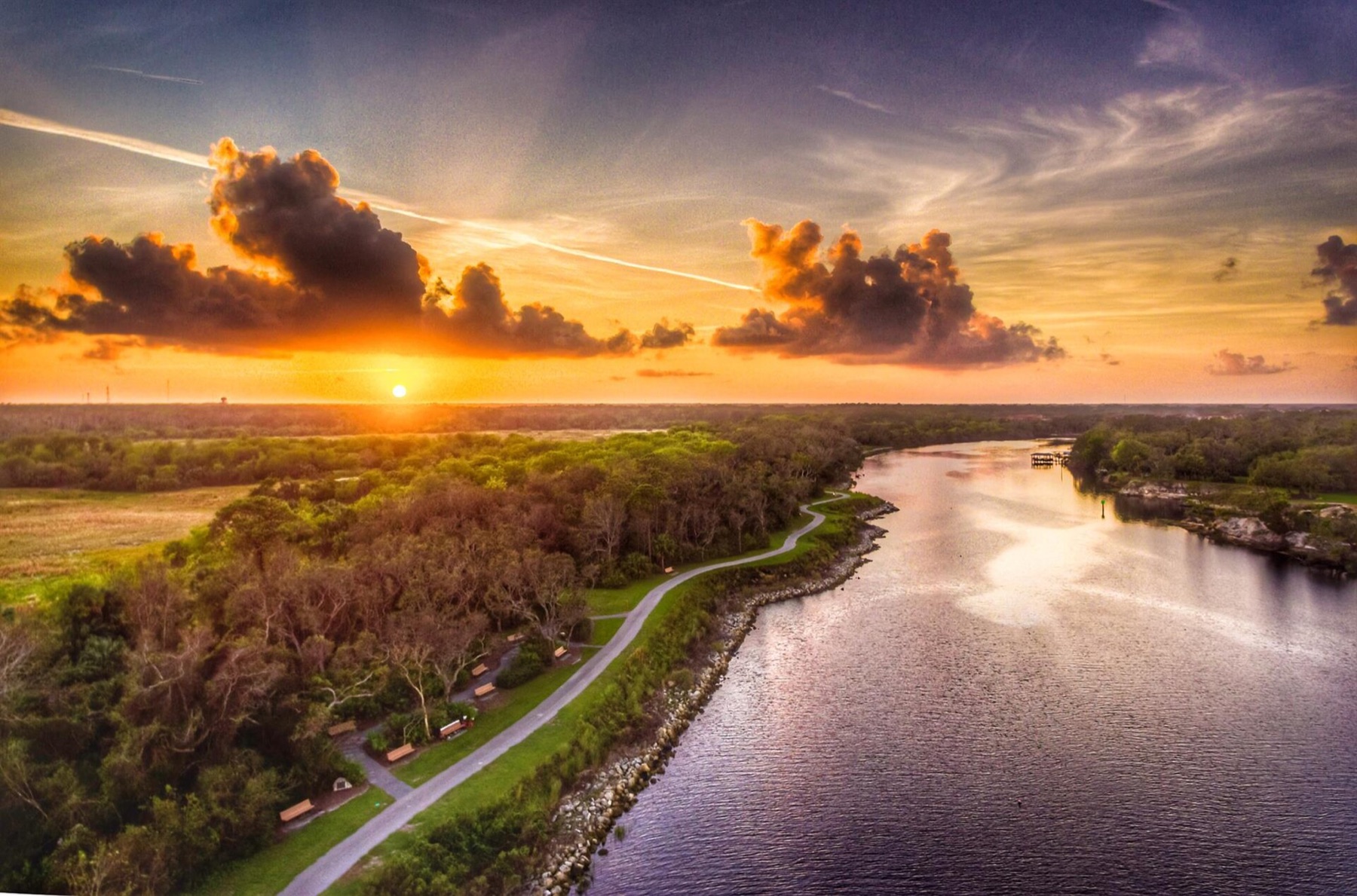 A Palm Coast waterway and trail at sunset